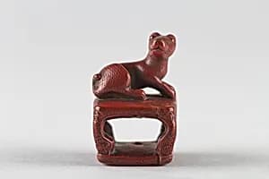 Netsuke of Dog on a Stand by Unknown Artist