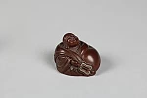 Netsuke of Hotei and Bag by Unknown Artist