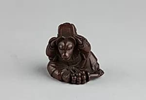 Netsuke of Fox Disguised as Shishimai Dancer by Unknown Artist