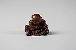 Netsuke of Daikoku and Bag by Unknown Artist