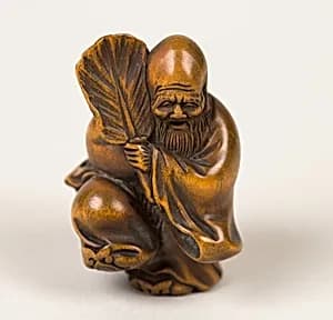 Netsuke of Old Man with a Fan by Unknown Artist