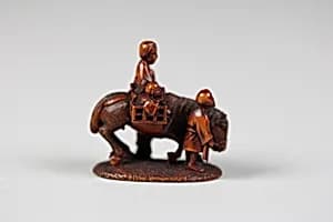 Netsuke of Figures with Horse by Unknown Artist
