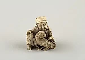 Seated figure of a Man with Dog by Unknown Artist