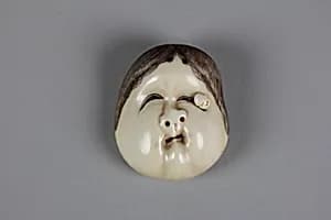 Netsuke of Okame with Wart Mask by Unknown Artist