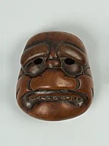 Netsuke of Kyōgen Mask: Buaku by Unknown Artist
