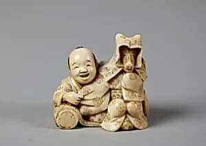Netsuke of Tokutaro and Fox, Disguised as Woman by Unknown Artist