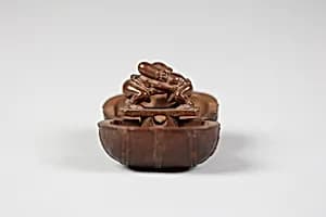 Netsuke of Bale of Rice; Inside are Daikoku and Fukurukujin, Wrestling by Unknown Artist