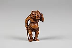 Netsuke of Demon with a Mask by Unknown Artist