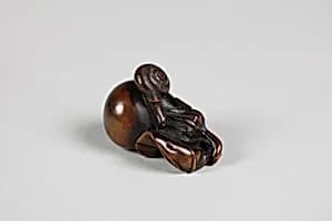 Netsuke of Snail on Eggplant by Unknown Artist
