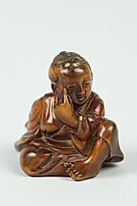 Netsuke of Boy with a Mask by Unknown Artist