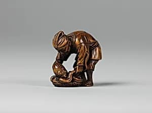 Netsuke of Snake Catcher by Unknown Artist