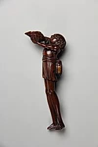 Netsuke of Ashinaga Blowing a Sea Horn by Unknown Artist