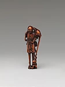 Netsuke of Ashinaga and Tenaga with an Octopus by Unknown Artist