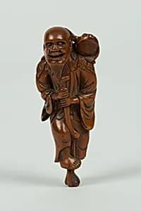Netsuke of Old Man Leaning on a Stick; Frog on His Shoulder by Unknown Artist
