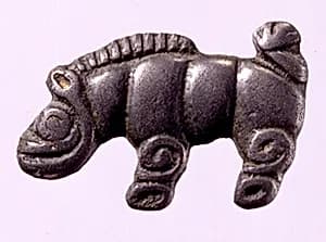 Garment Plaque in the Shape of a Wild Boar by Unknown Artist