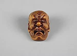 Netsuke of Mask of Old Man's Face by Unknown Artist