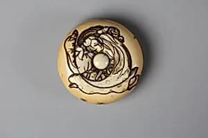 Netsuke of Woman with a Demon by Unknown Artist