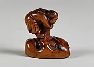 Netsuke of Mask; Uzume (Okame) and a Tengu mask by Unknown Artist
