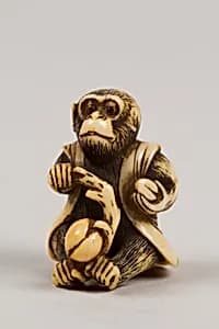Netsuke in the Shape of a Monkey with a Peach by Unknown Artist