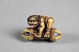 Netsuke of Ōni on Vadra, Crouching by Unknown Artist