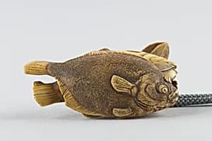 Netsuke of Fish on Bamboo Leaves by Jugyoku