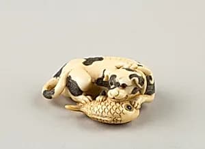 Netsuke of a Dog and a Fish by Unknown Artist