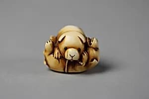 Netsuke of Puppies at Play by Unknown Artist
