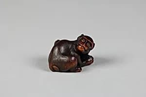 Netsuke of Monkey Scratching His Back by Unknown Artist