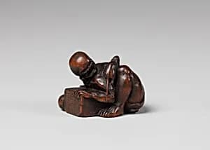 Netsuke of Man who Misses Catching a Rat by Unknown Artist