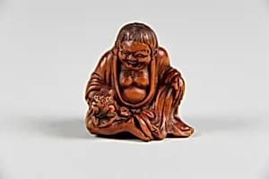 Netsuke of Old Woman with a Toad in her Hand (Gama Sennin) by Unknown Artist