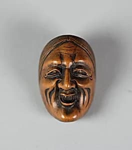 Netsuke of Noh Mask; Uba by Unknown Artist