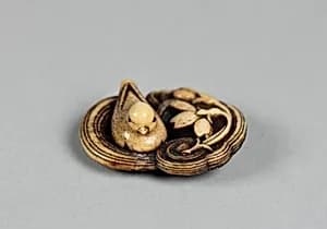 Netsuke of Bird on her Nest by Unknown Artist