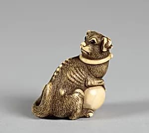 Netsuke of Cat with a Ball by Unknown Artist
