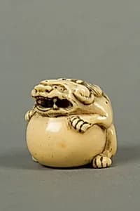 Netsuke of Qilin and Ball by Unknown Artist