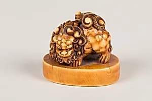 Netsuke of Qilin on a Pedestal by Unknown Artist