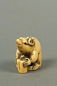Netsuke of Mouse Gnawing on Candle by Unknown Artist