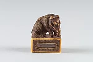 Netsuke of Elephant on a Seal by Unknown Artist