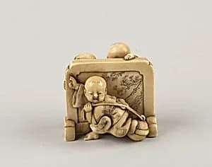 Netsuke of Three Boys Playing around a Screen by Unknown Artist