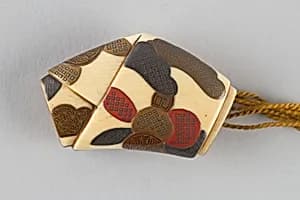 Netusuke in the Shape of a Knotted Letter, with Problems Written on and Tied to Branches by Unknown Artist