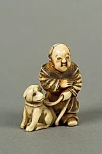 Netsuke of Boy with a Dog by Unknown Artist