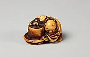 Netsuke of Merchant by Unknown Artist