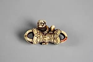 Netsuke of Demon with Gold Eyes by Unknown Artist