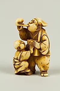 Netsuke of Man and Child by Unknown Artist