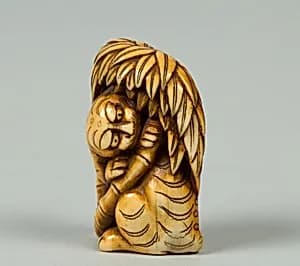 Netsuke of Tiger under a Bamboo Tree by Unknown Artist