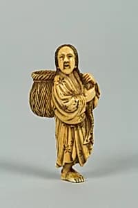 Netsuke of a Girl Carrying a Basket on her Back by Unknown Artist