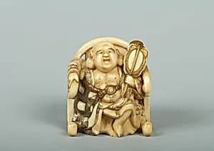 Netsuke of Hotei Seated in an Armchair by Unknown Artist
