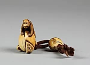 Netsuke of Monkey on Peach by Unknown Artist