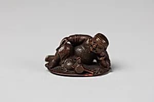 Netsuke of Daikoku and Mallet on Coin by Unknown Artist