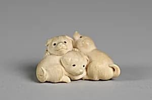Netsuke of Three Puppies by Unknown Artist