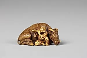Netsuke of Ox with Bokudo by Unknown Artist